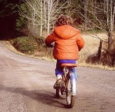 child learning biking