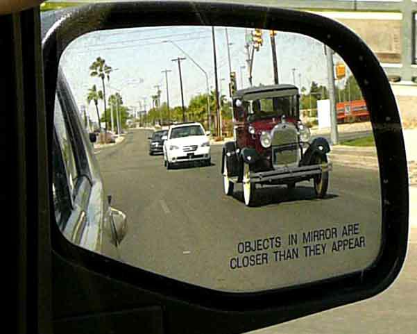 looking into the rear-view mirror