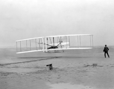 The first powered flight by the Wright brothers